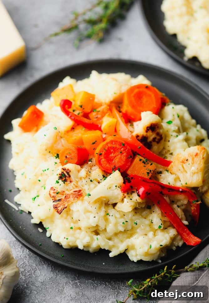close up of risotto with lots of vegetables on top