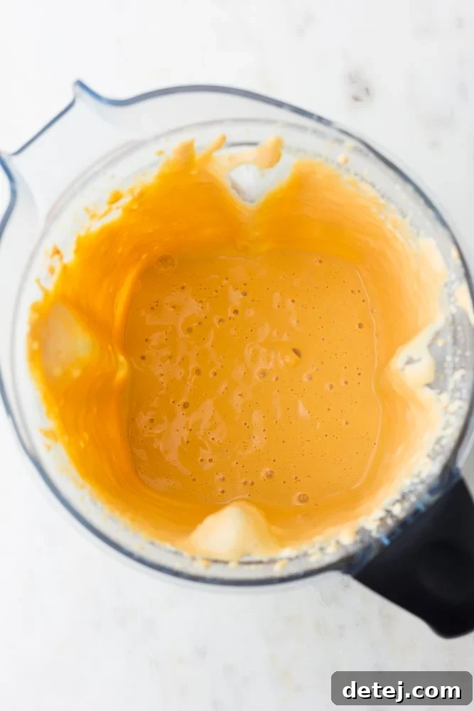 blended tofu mixture for vegan omelette, in a blender