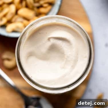 close up on a jar of cashew cream.