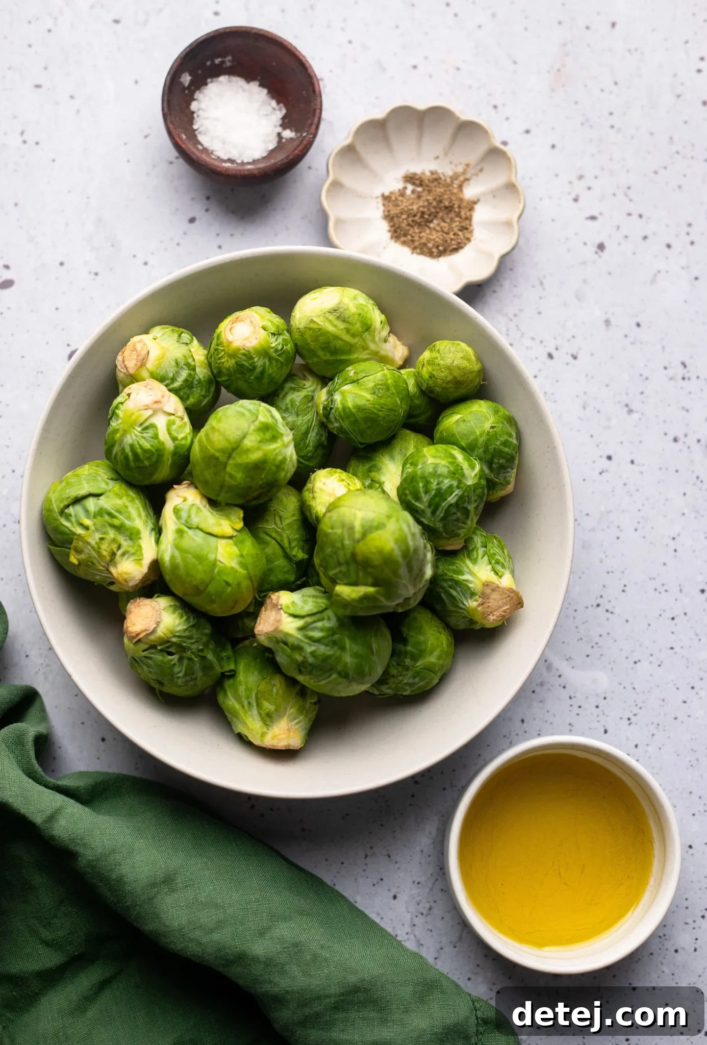 ingredients for air fryer brussels sprouts in individual bowls.
