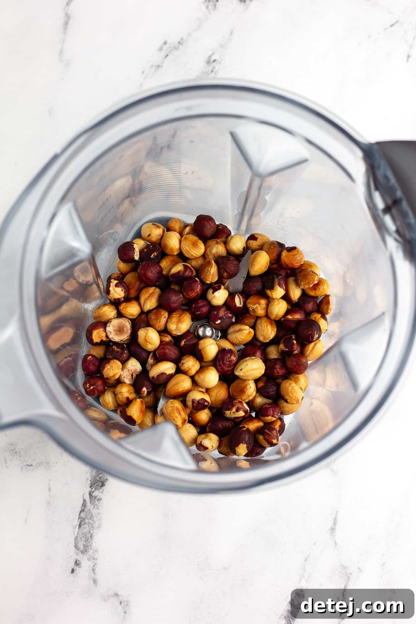 roasted hazelnuts in a blender.