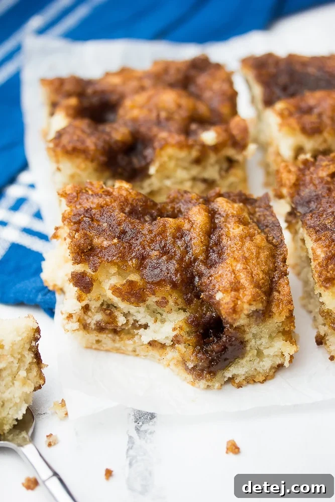 a piece of vegan coffee cake with a bite taken out
