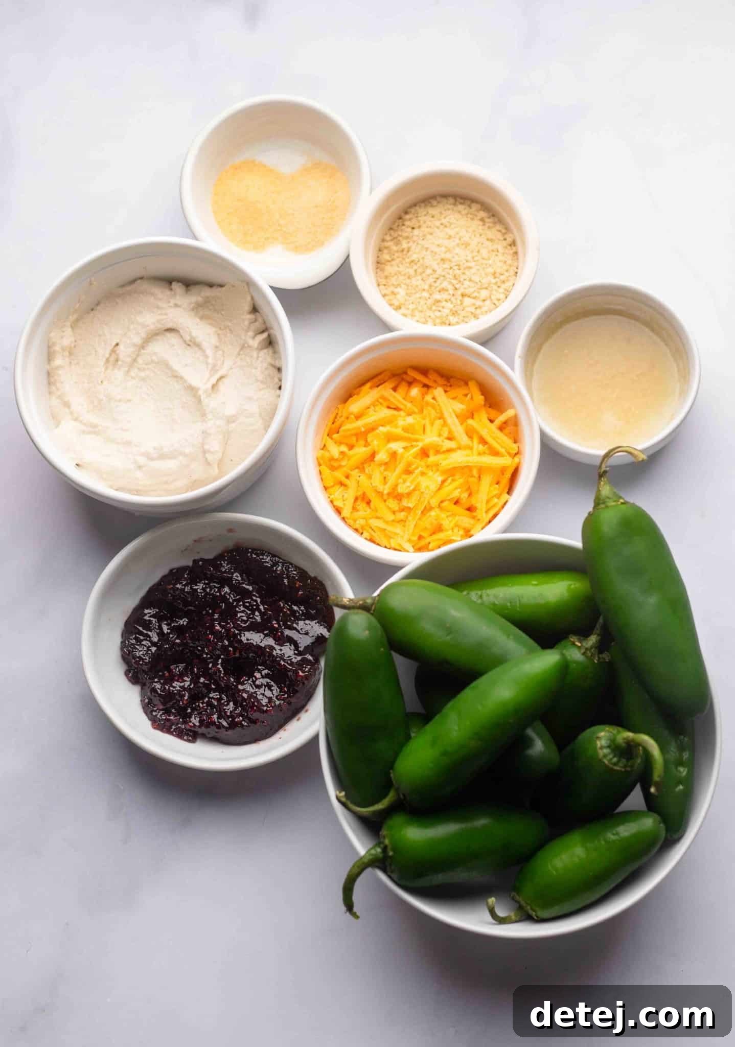 ingredients for Vegan Jalapeno Poppers in individual white bowls.