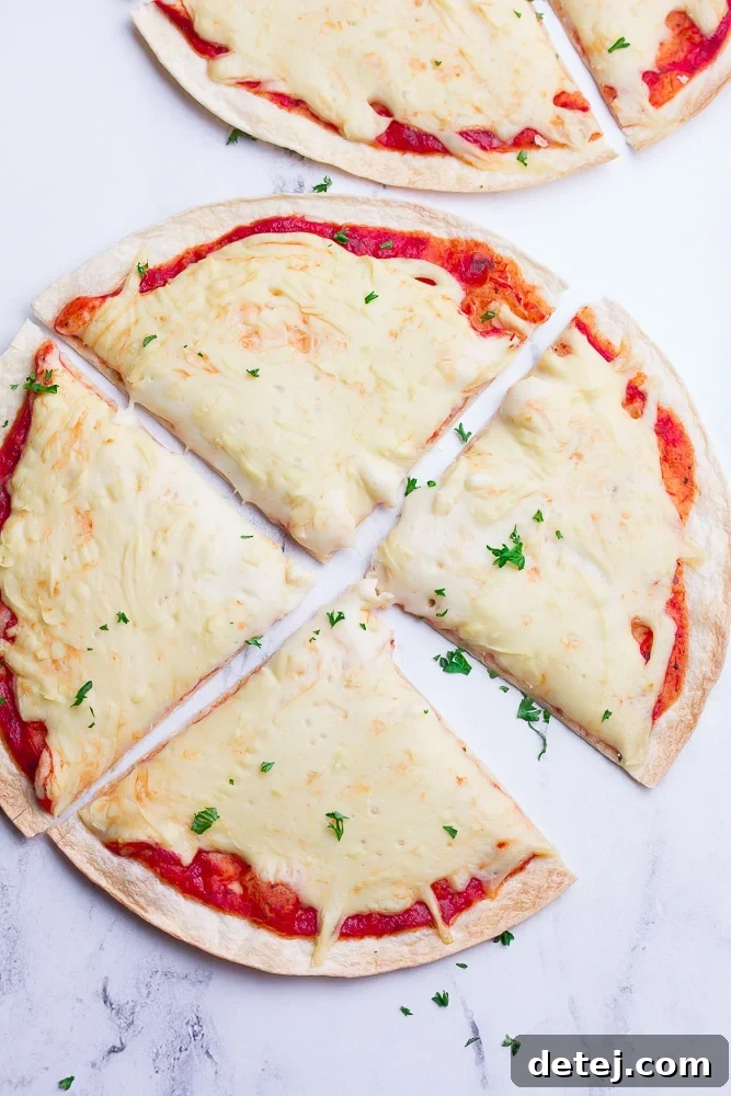 A beautifully cooked whole pizza, generously topped with melted vegan mozzarella, ready to be served and enjoyed.