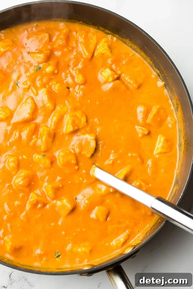 Creamy Vegan Tikka Masala 3 large pan full of vegan tikka masala