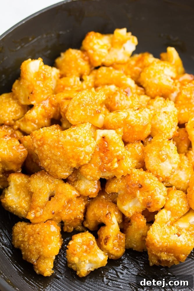 Sunset Cauliflower 3 pan with orange cauliflower, soaked in sauce