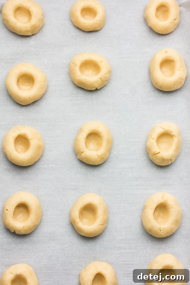 lemon shortbread cookies without lemon curd lined up in three rows