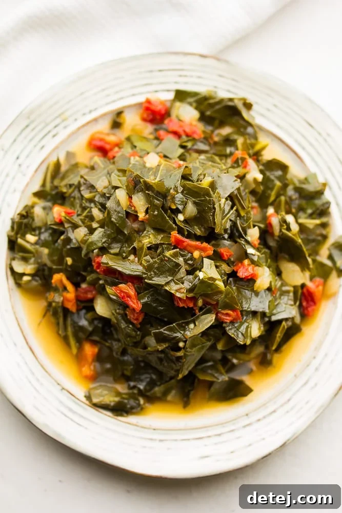 Smoky Vegan Collard Greens 3 plate full of cooked collard greens with sun dried tomatoes