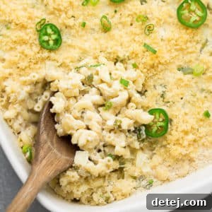 square image of pan of mac and cheese with jalapenos