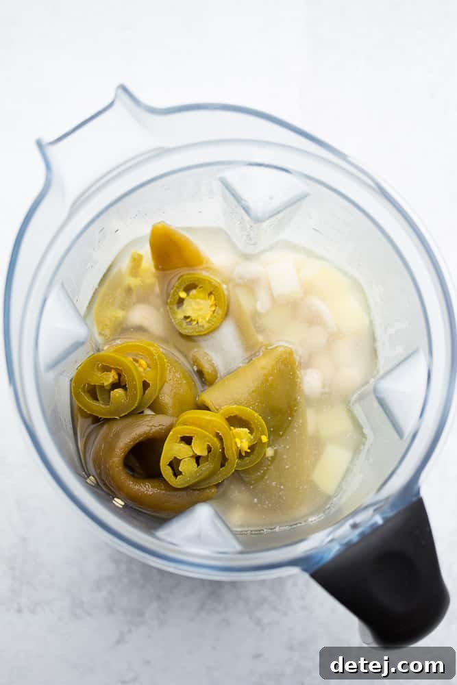 jalapenos and green chiles in blender with cashews