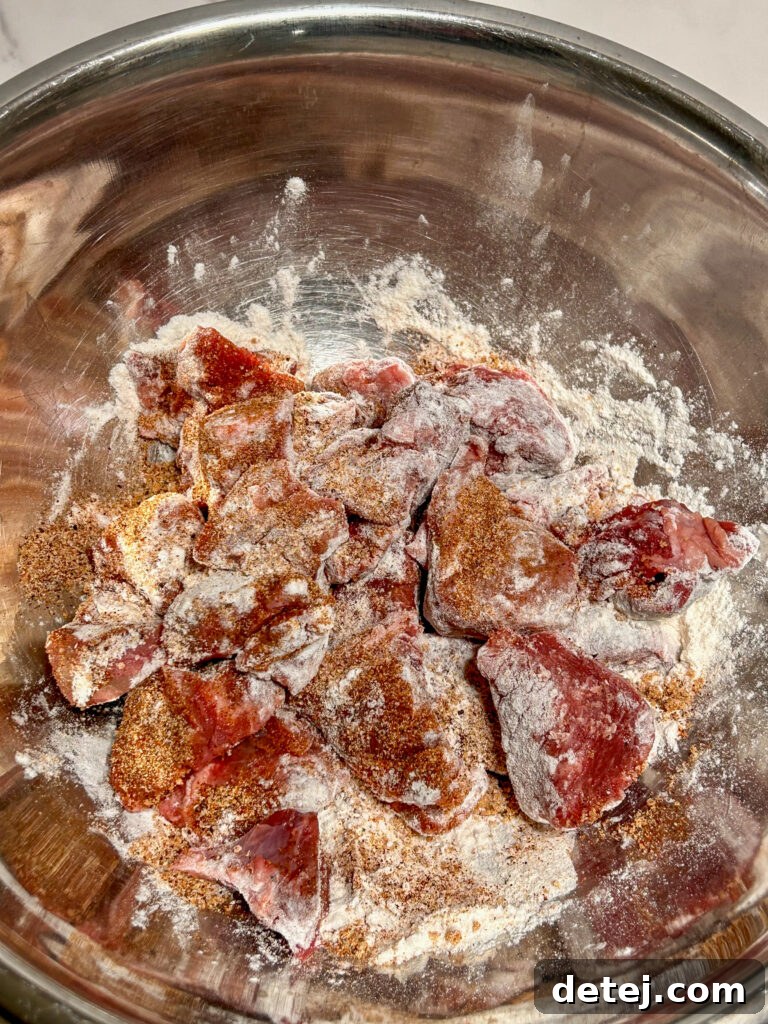 Close-up of cubed sirloin tips seasoned and ready for searing.
