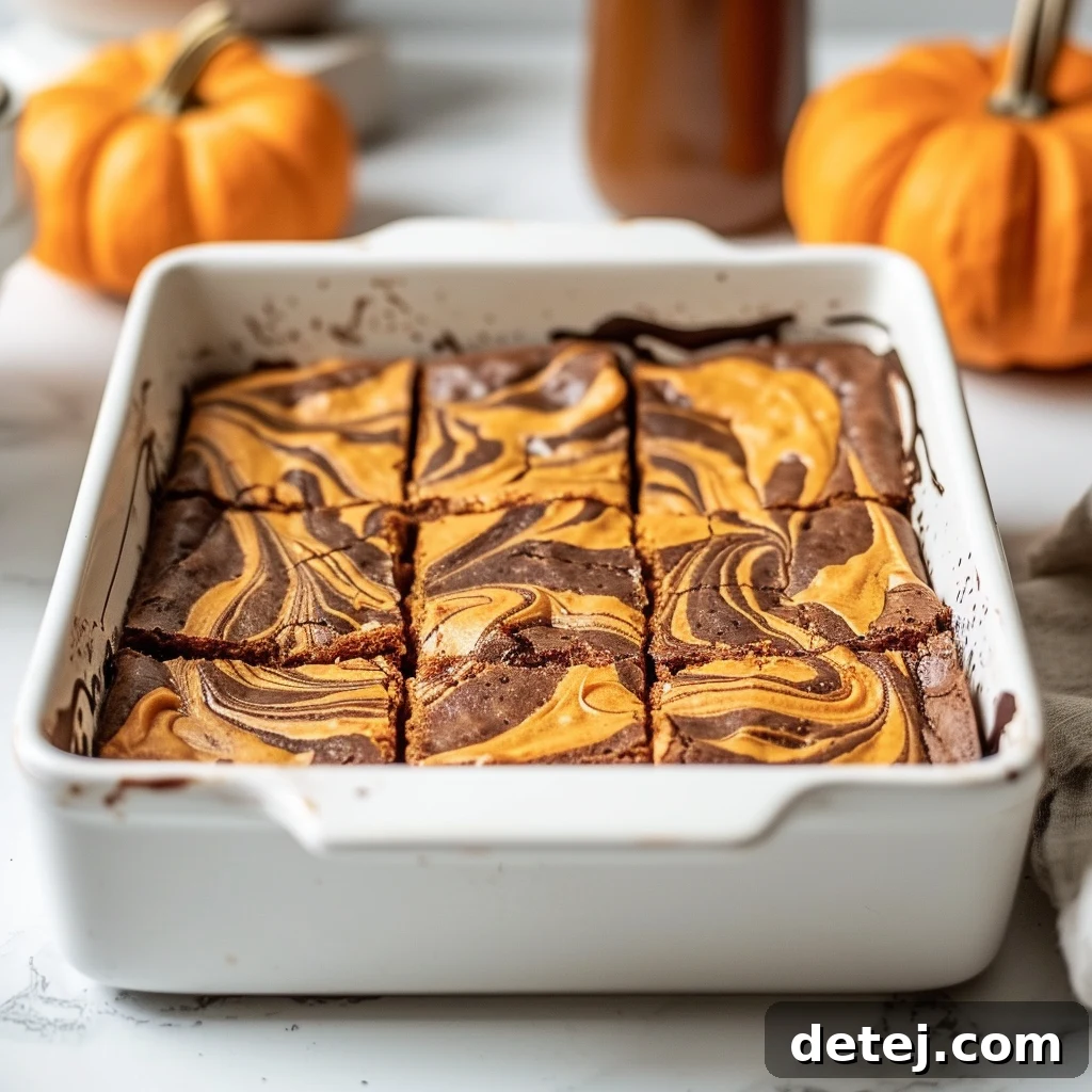 Pumpkin Swirl Brownies baking in a pan