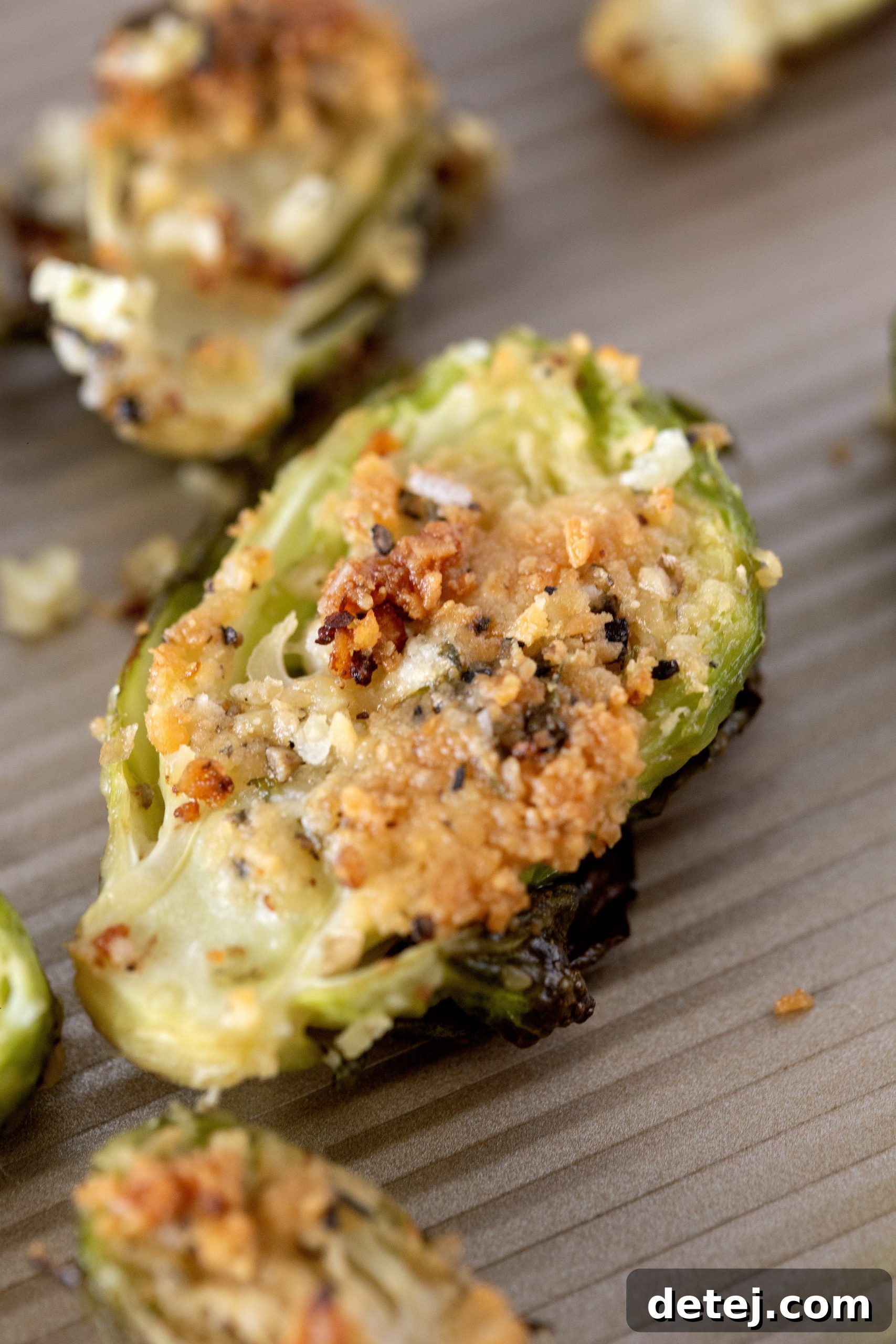 Ingredients for Parmesan Crusted Brussels Sprouts including Parmesan cheese, butter, garlic, and seasoning