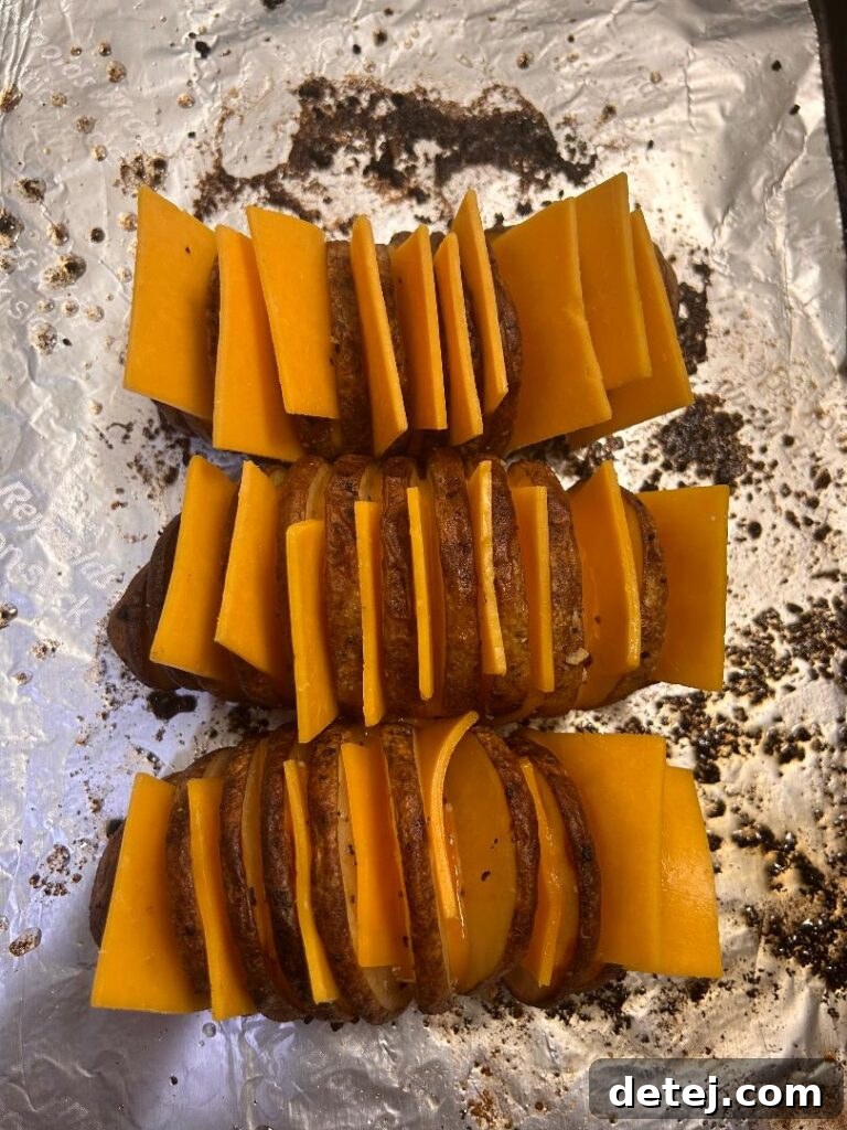 Cheesy Hassleback Potatoes baked to golden perfection