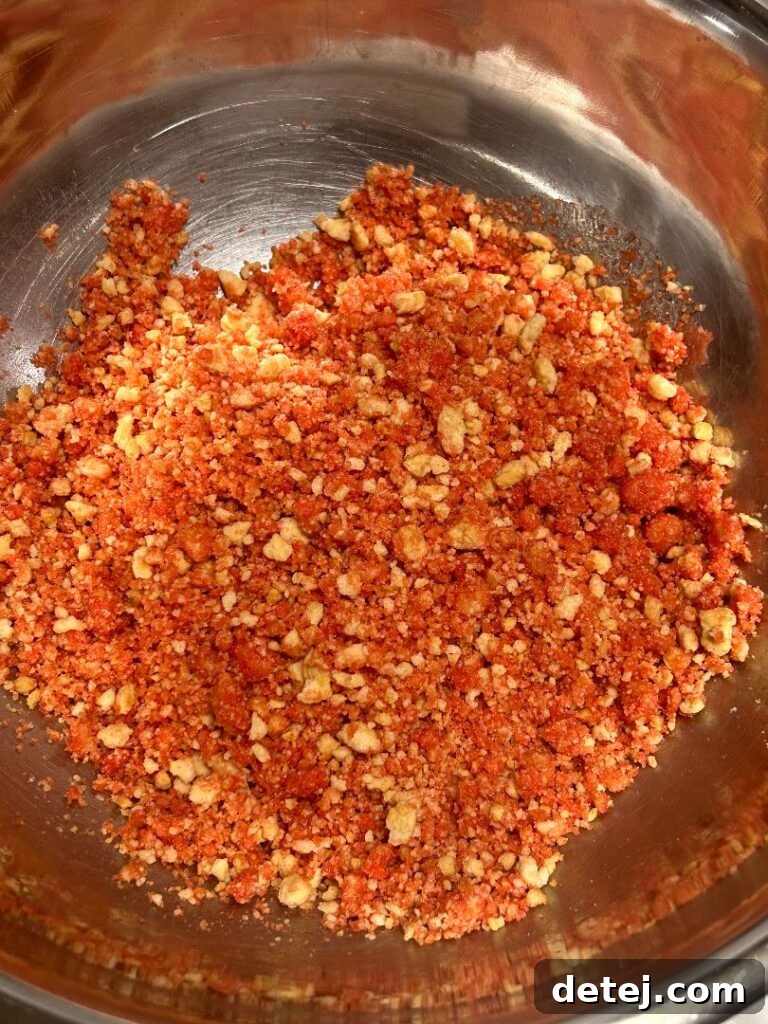 Strawberry crunch topping ingredients in a bowl.