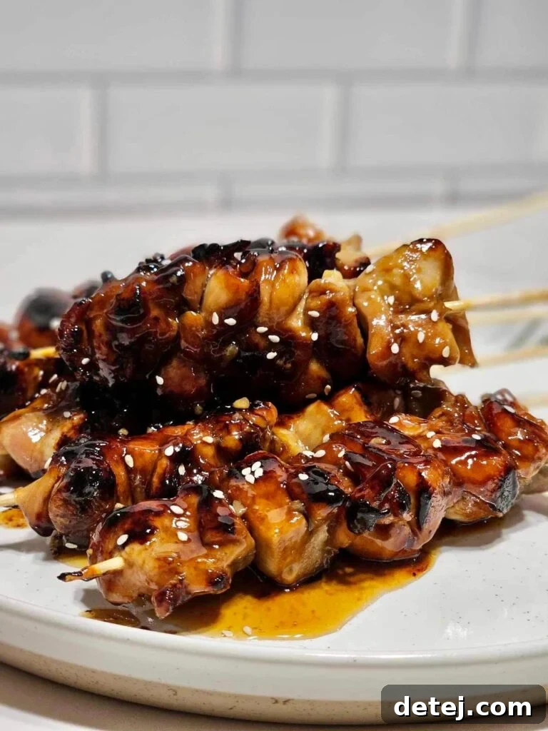 Sticky Bourbon Chicken 6 Close-up of Bourbon Teriyaki Skewers with toppings