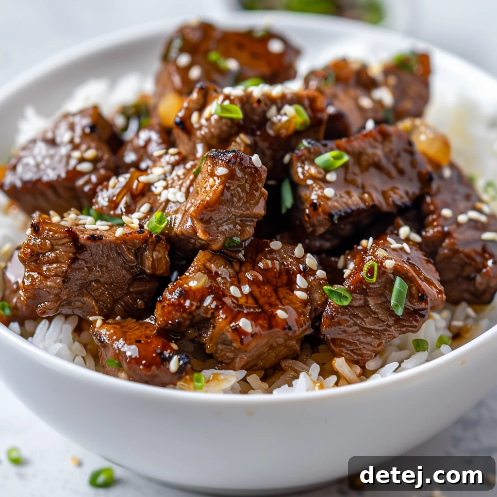 Honey Garlic Steak Bites garnished and ready to serve