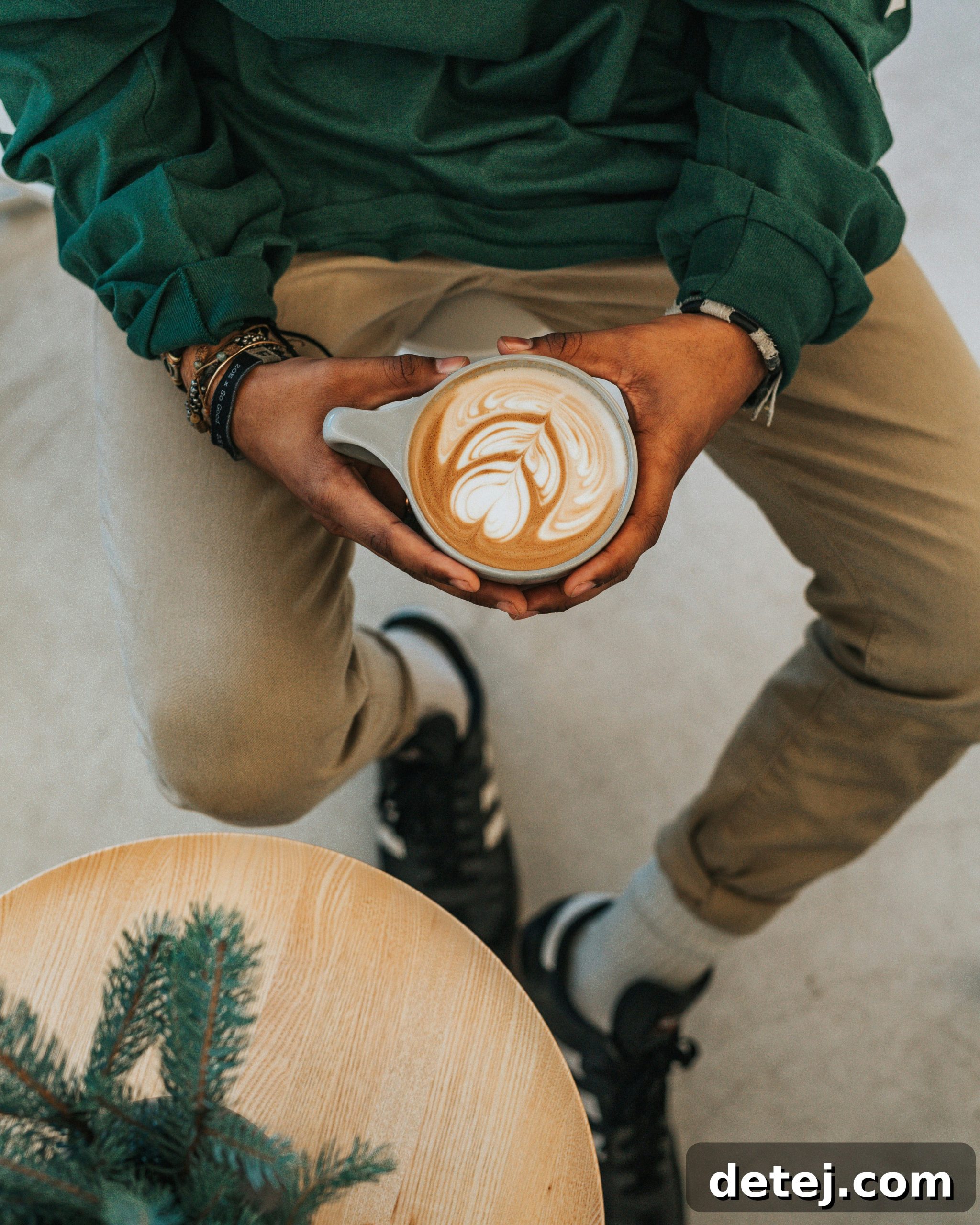 An inspiring image of a coffee cup with a leafy background, symbolizing environmental responsibility and sustainable coffee choices.