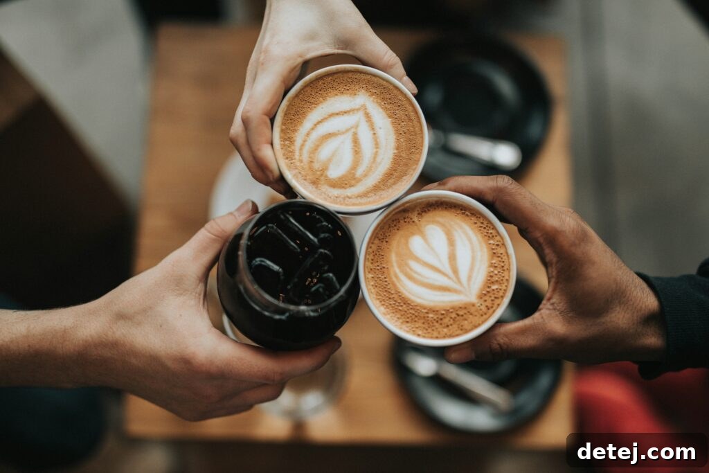 Omeprazole and Coffee: What's the Wait 3 Close-up of a steaming coffee cup with foam art, symbolizing the art of mindful coffee consumption for health.