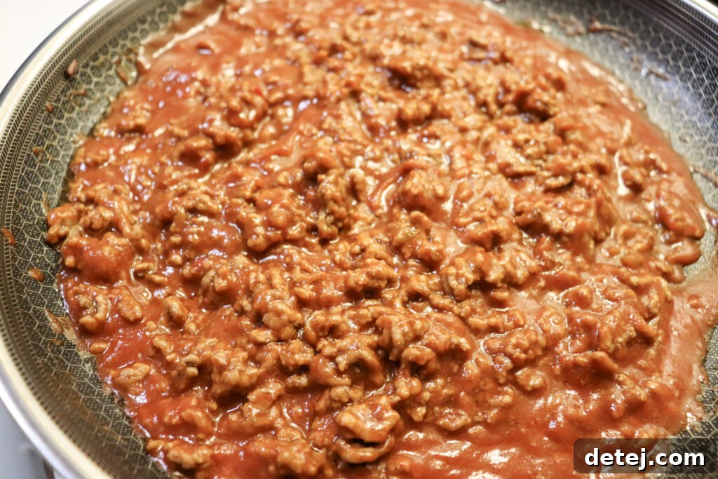 Manwich sauce added to browned ground beef