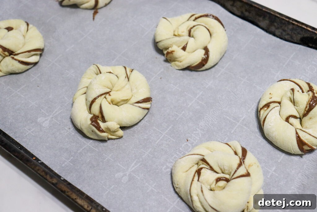 Spreading Nutella on puff pastry