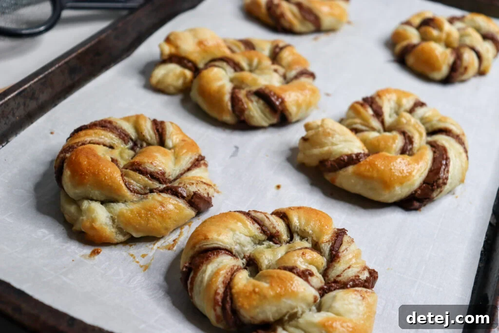Baked Nutella Puff Pastries with golden glow