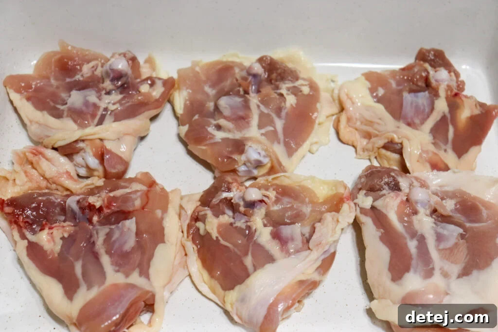 Effortless Golden Baked Chicken Thighs 3 Easy Oven Baked Chicken Thighs with fresh herbs