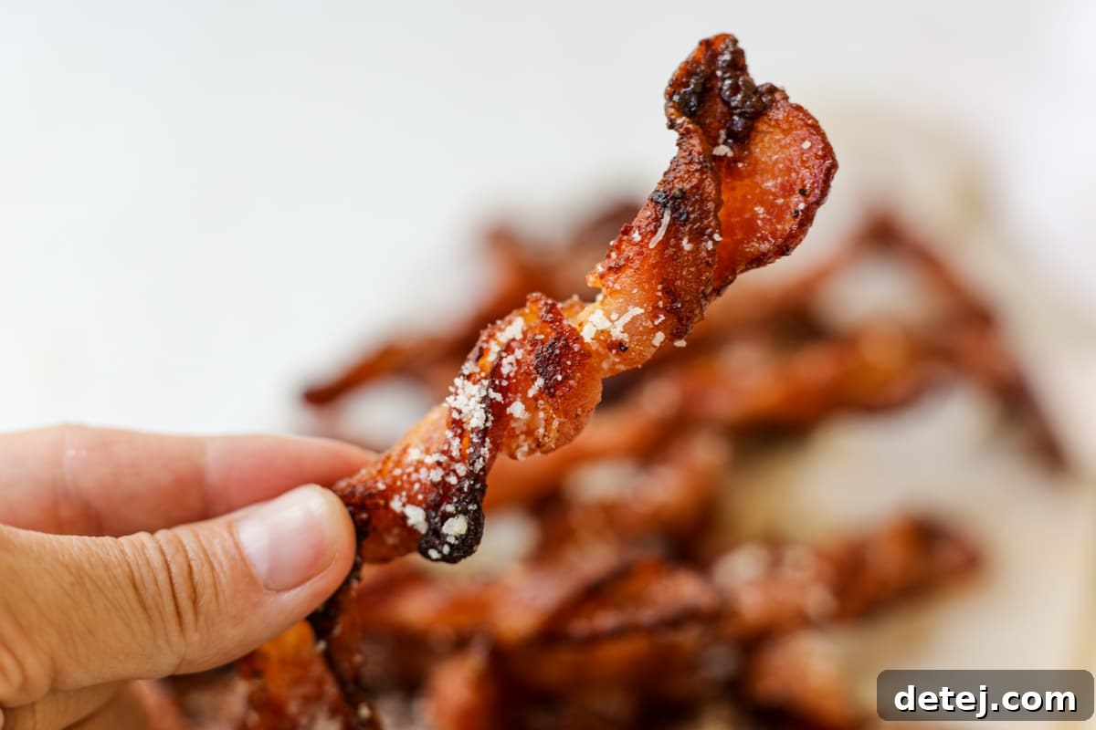 Ingredients for Parmesan Black Pepper Bacon Twists, including bacon, parmesan cheese, and black pepper