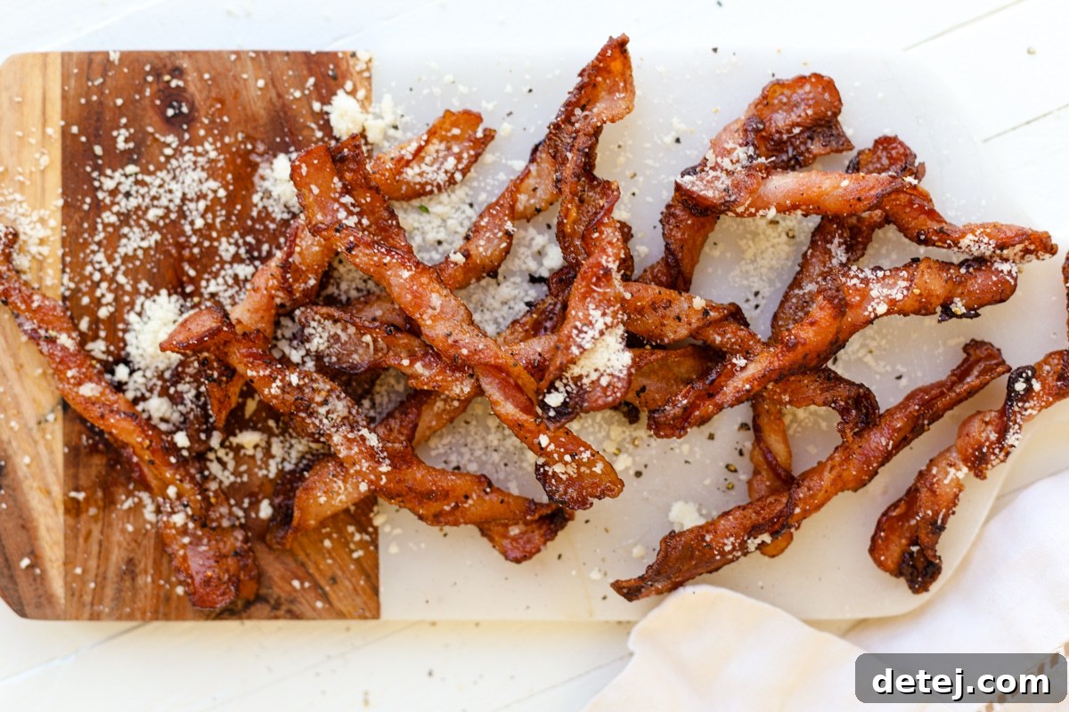 Parmesan Black Pepper Bacon Twists arranged on a white plate, ready for serving