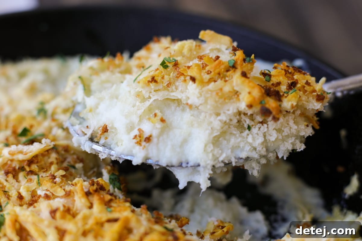 Serving of Parmesan Mashed Cauliflower Gratin with a golden crust