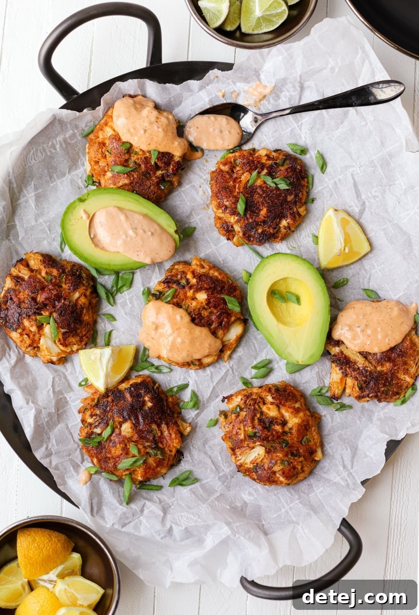 Plated Spicy Crab Cakes with Lemon - Healthyish Foods