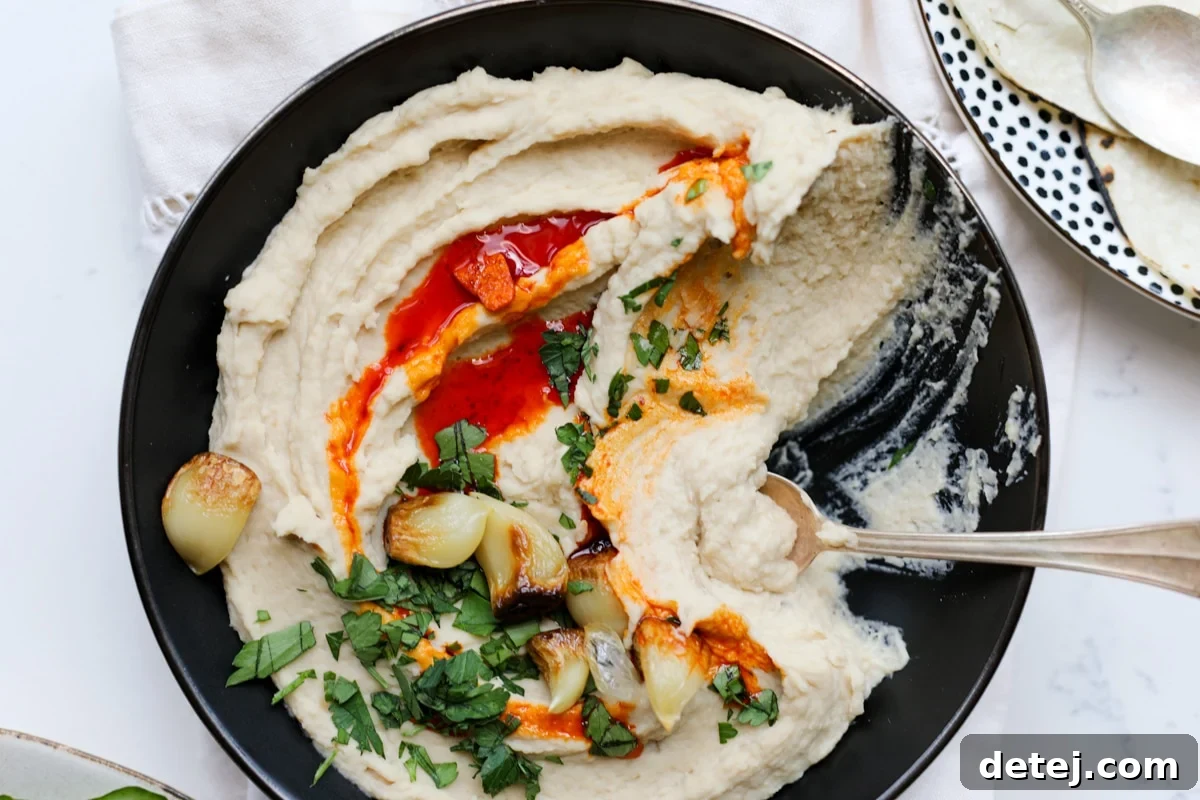 Easy Roasted Garlic White Bean Dip – Healthyish Foods, a creamy and delicious dip with roasted garlic and cannellini beans.