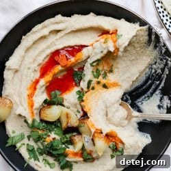 Easy Roasted Garlic White Bean Dip – Healthyish Foods, a visually appealing appetizer.
