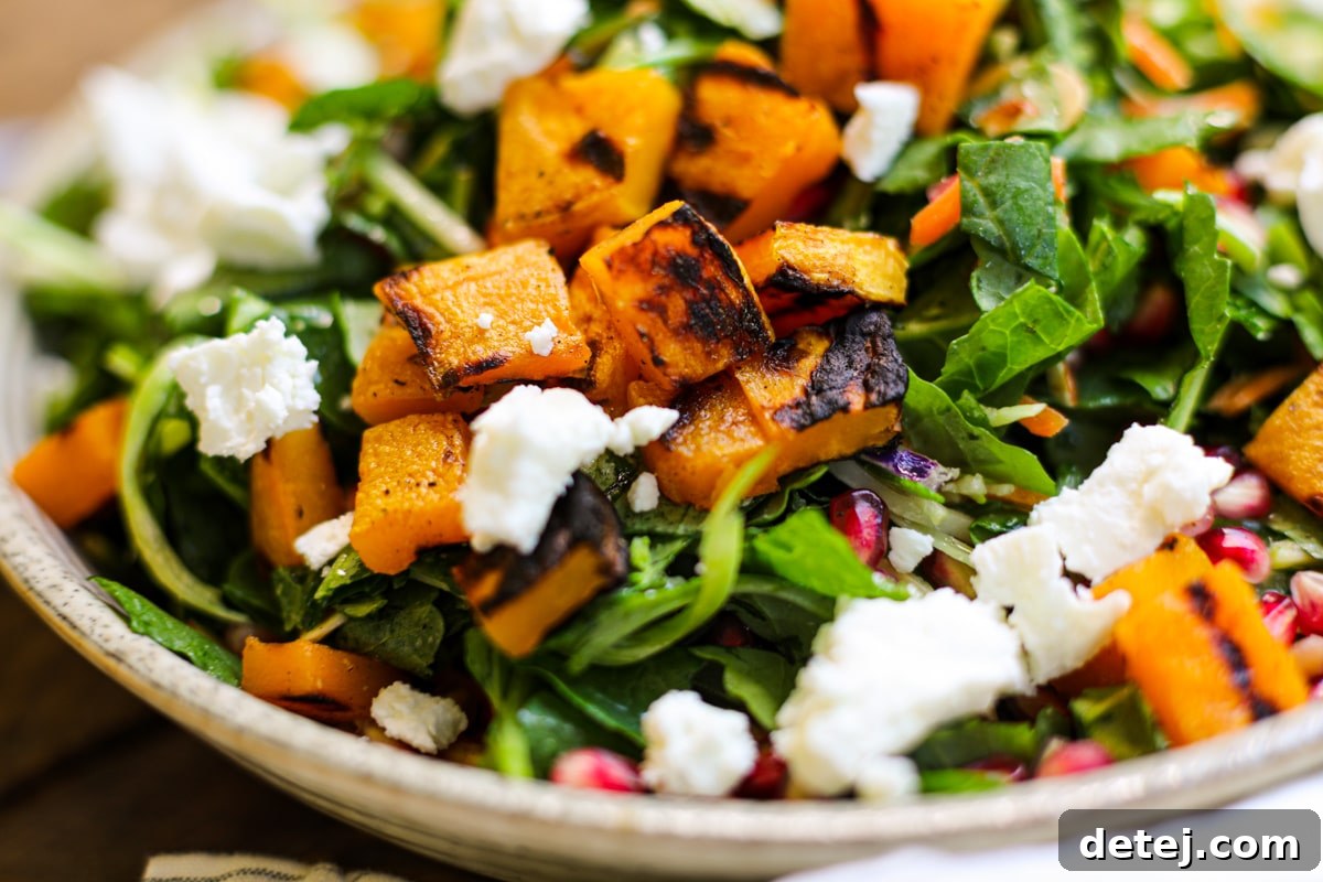 Fire-Kissed Butternut Greens 4 Overhead shot of the Grilled Butternut Squash Salad, showcasing its autumn colors and fresh ingredients.