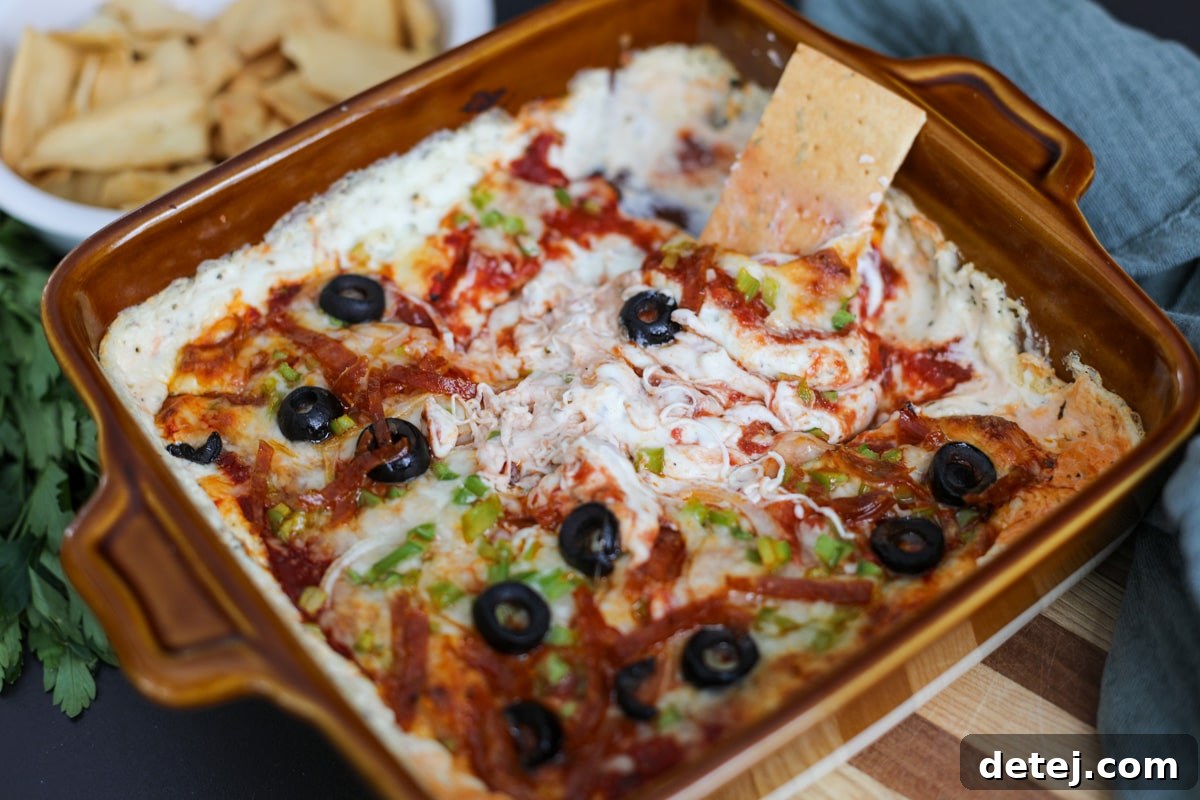 cracker in the pizza dip.