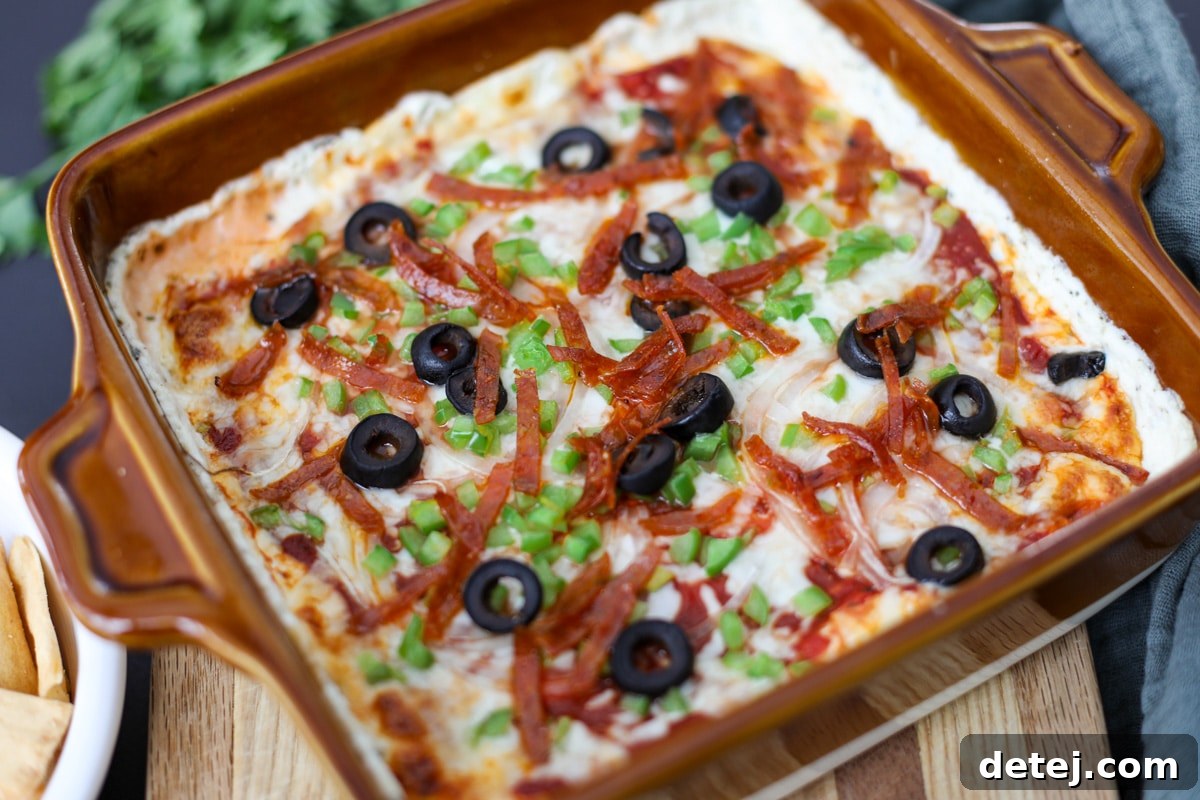 pizza dip with toppings.