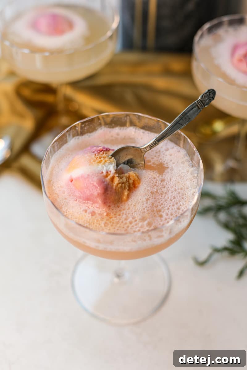 Vibrant Rainbow Sorbet Mimosa, a delightful and easy brunch cocktail, showcasing layers of color and bubbles in a elegant glass.