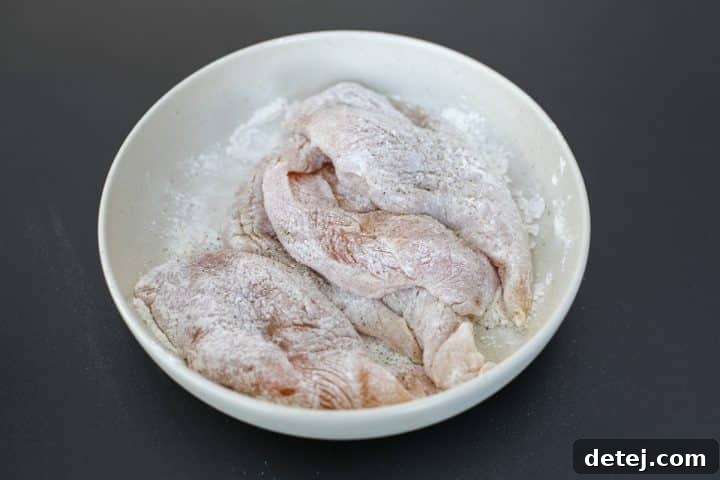 dredge through flour and seasoning. 