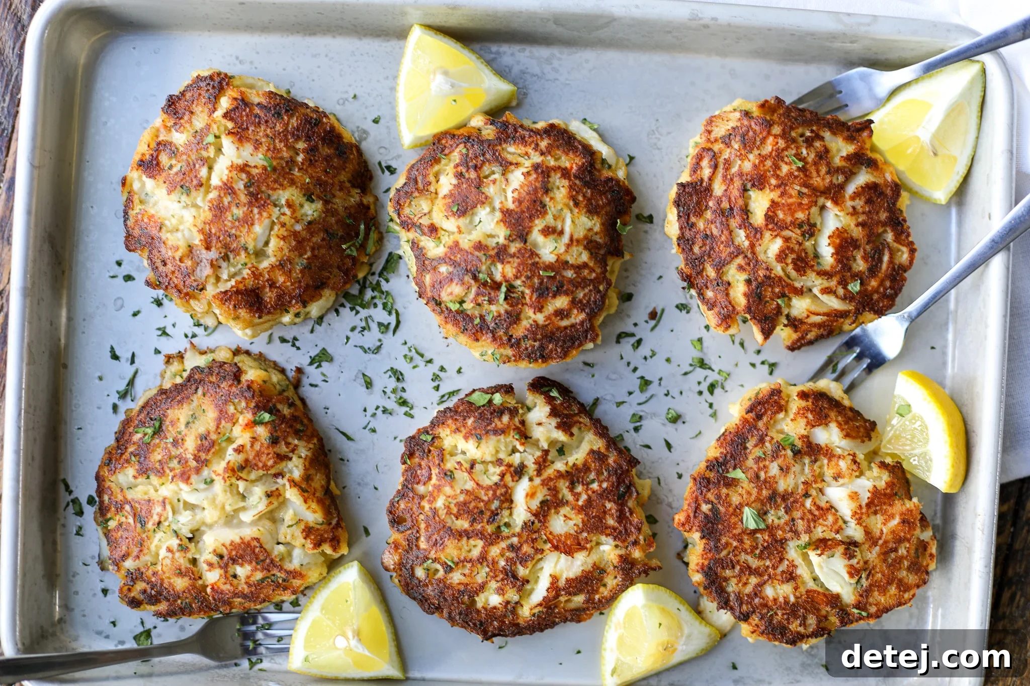 Raw classic crab cakes patties ready for cooking