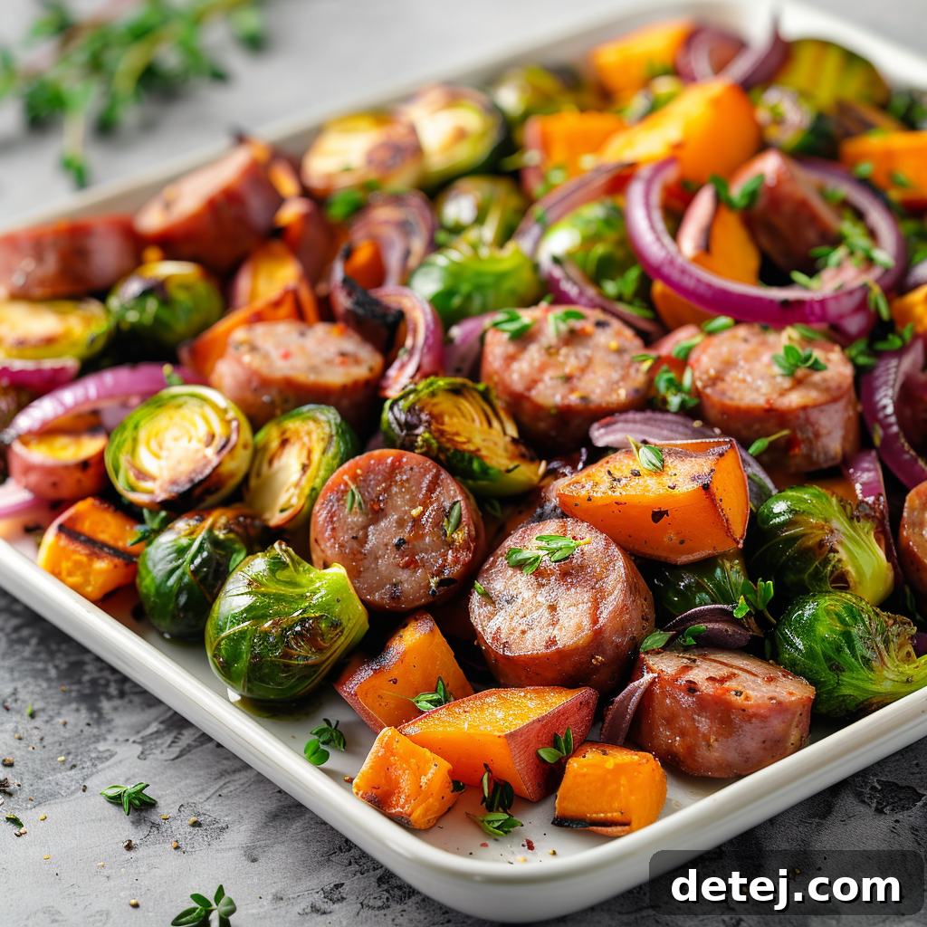 Sweet and Savory Maple Dijon Sheet Pan Dinner 3 Close-up of roasted Brussels sprouts and sweet potatoes