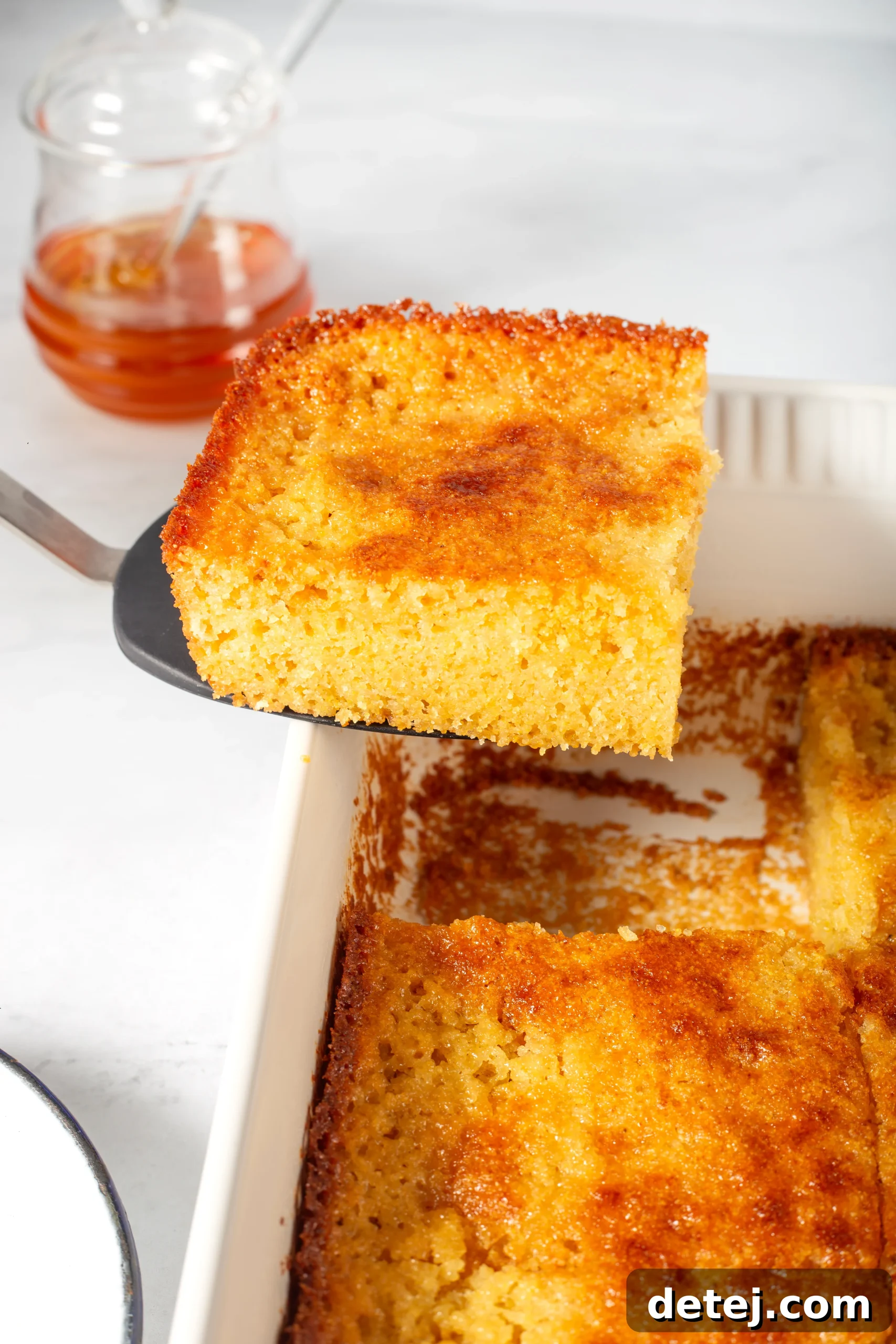 golden honey cornbread with a perfectly crisp crust