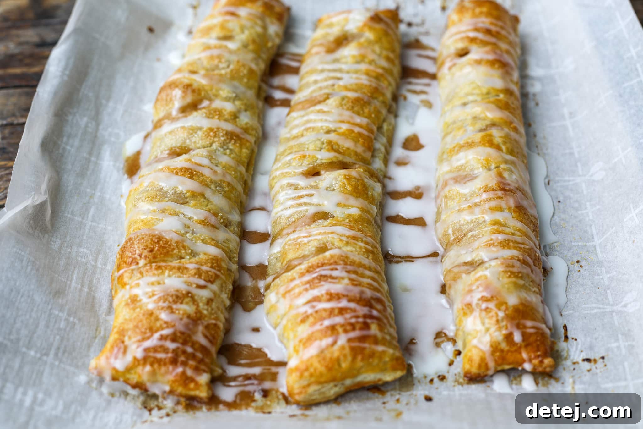 Apple Strudel Logs sliced into servings, garnished with mint.