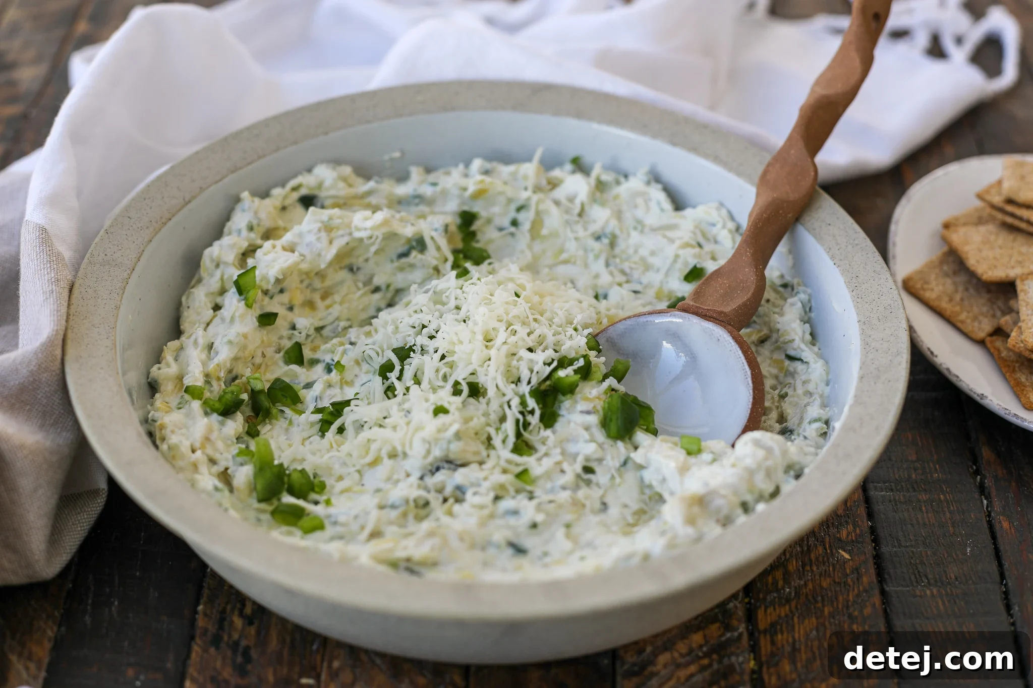 Creamy, flavorful, and healthyish Jalapeno Artichoke Cheese Dip, perfect for game day or a healthy snack.