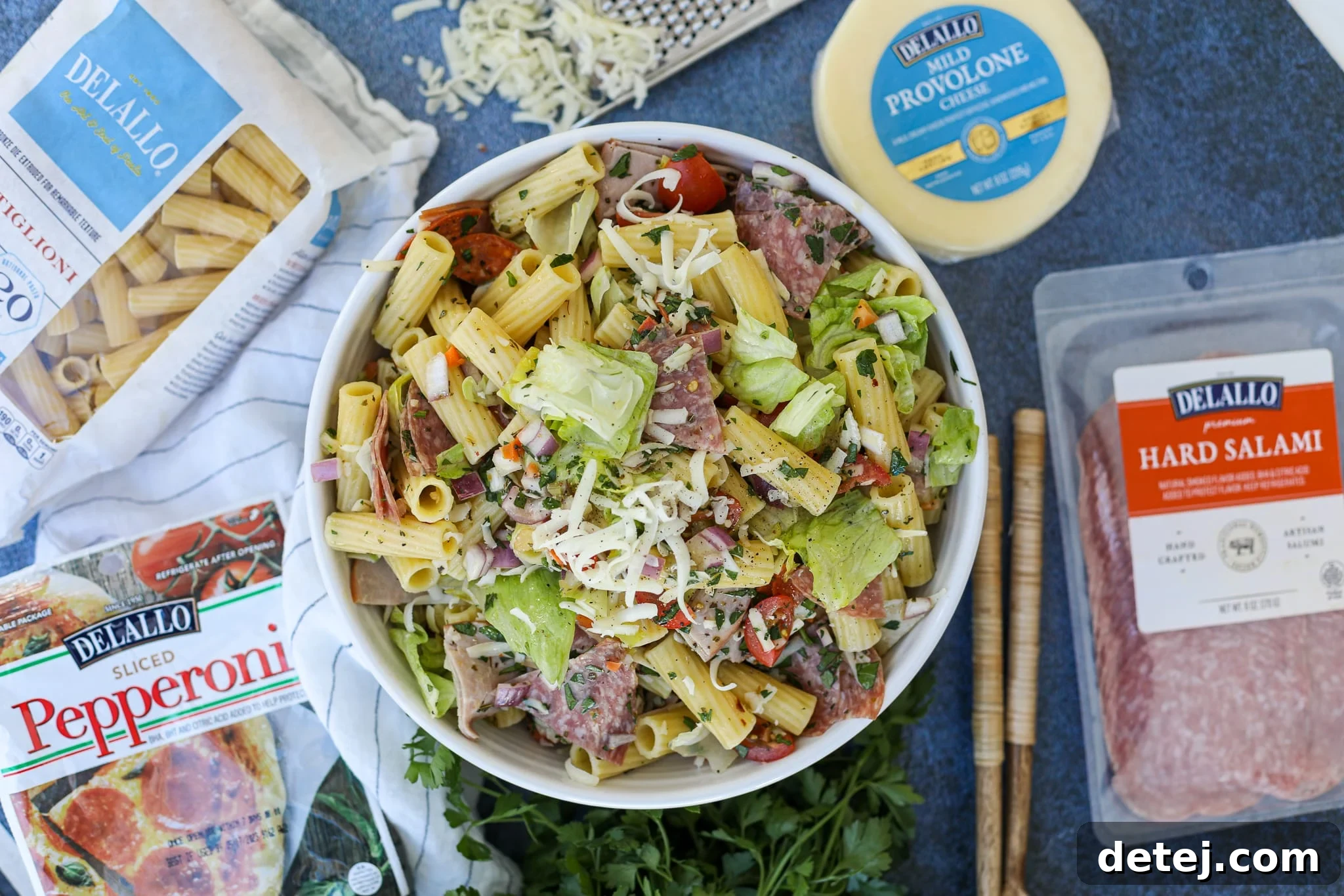 Close-up of the Italian Grinder Pasta Salad ingredients, highlighting the sliced meats, cheese, and pasta.