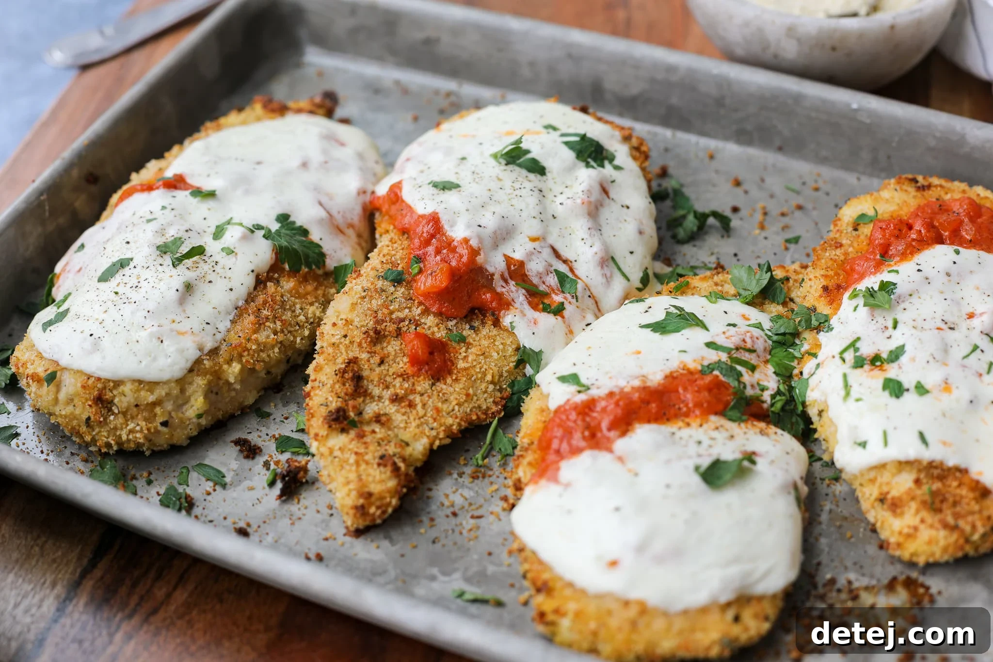 Ingredients laid out for Baked Chicken Vodka Parmesan preparation