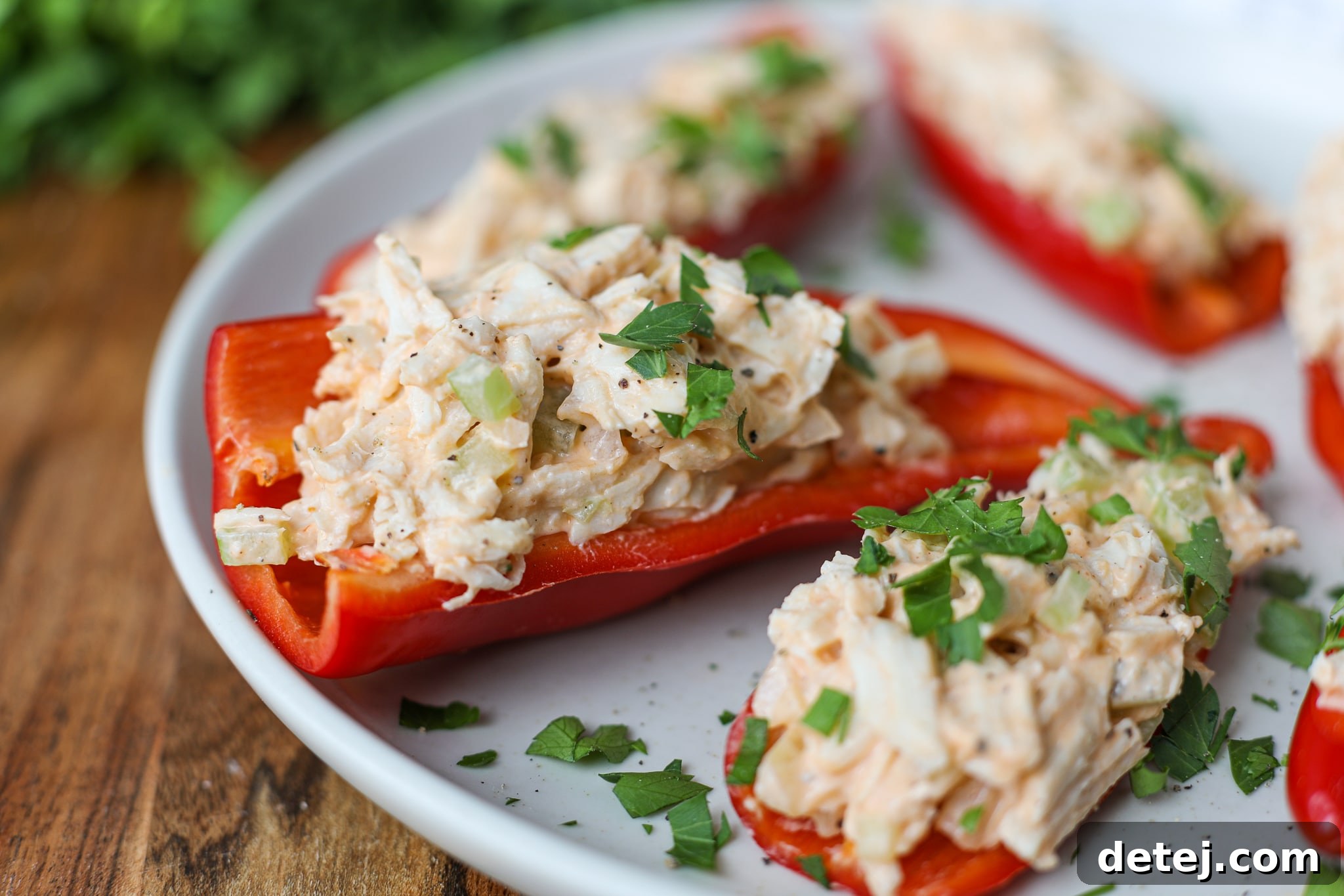 Shredded Buffalo Chicken Salad in a bowl - Healthyish Foods