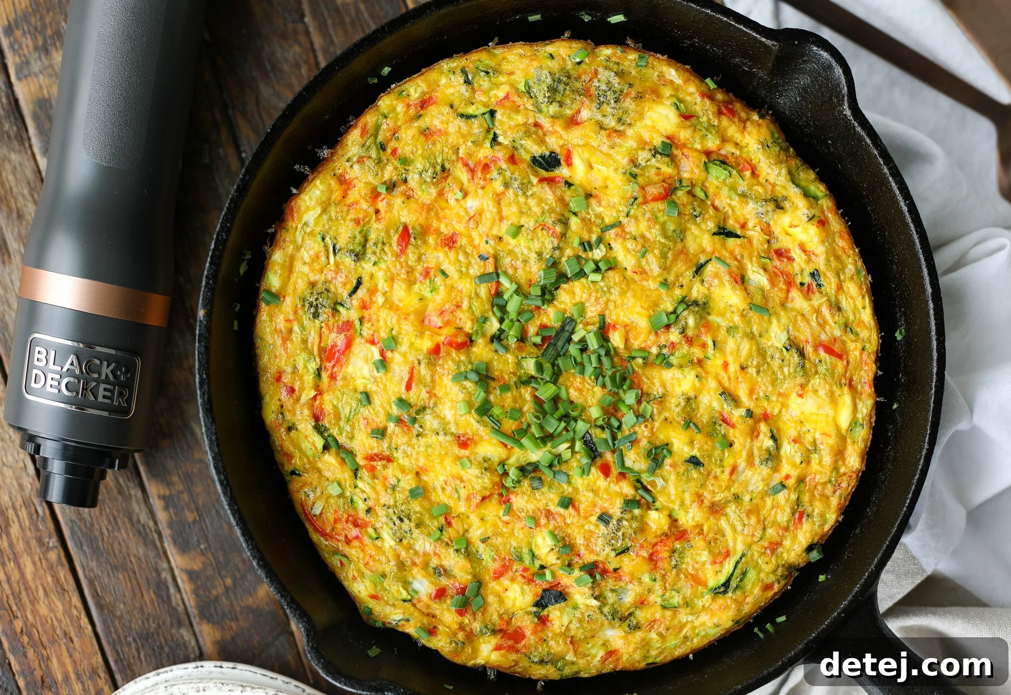 Beautifully baked High Protein Cottage Cheese Frittata in a cast iron pan