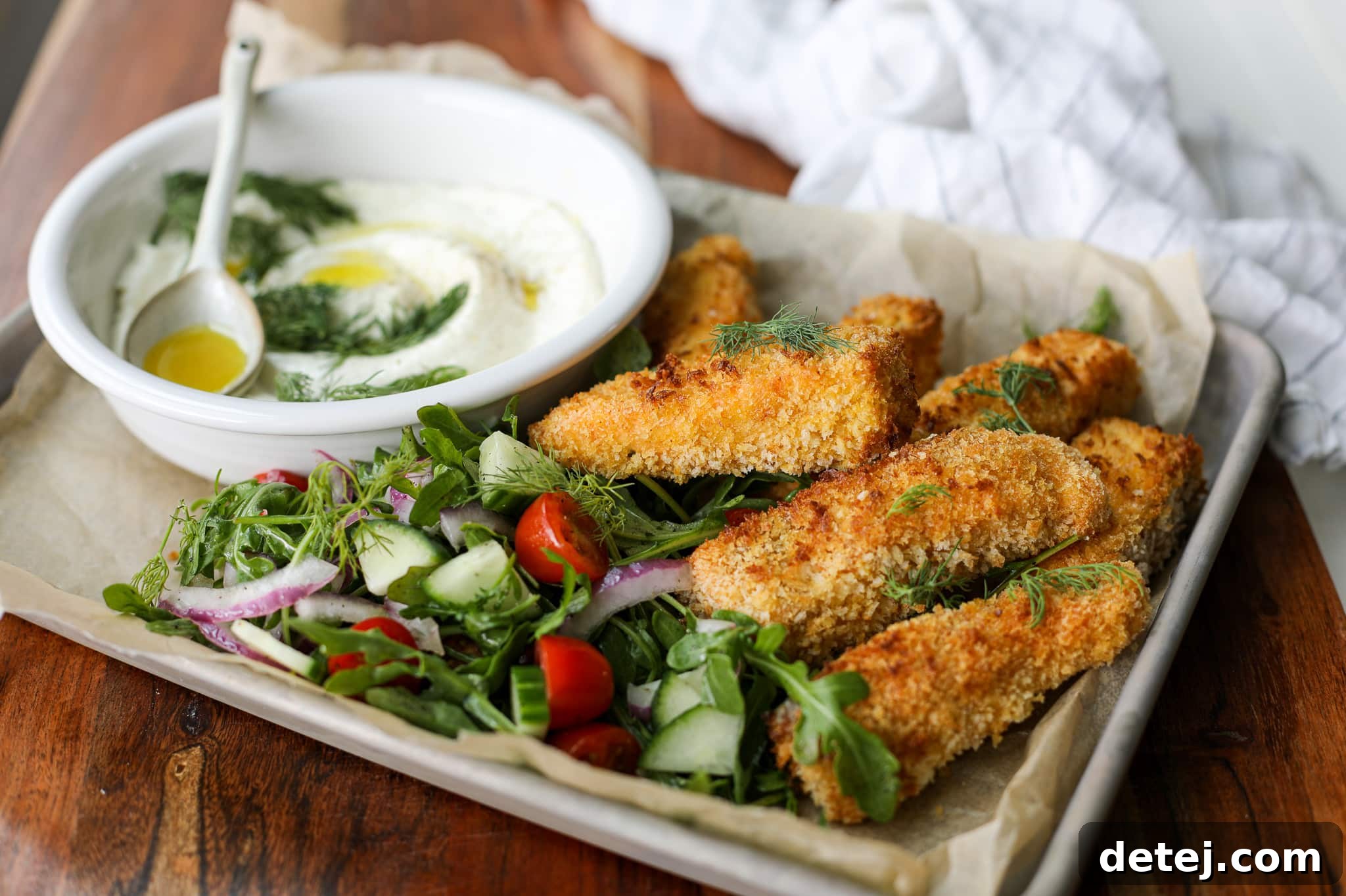 A close-up of crispy Air Fryer Salmon Fish Sticks, golden and inviting, ready to be enjoyed.