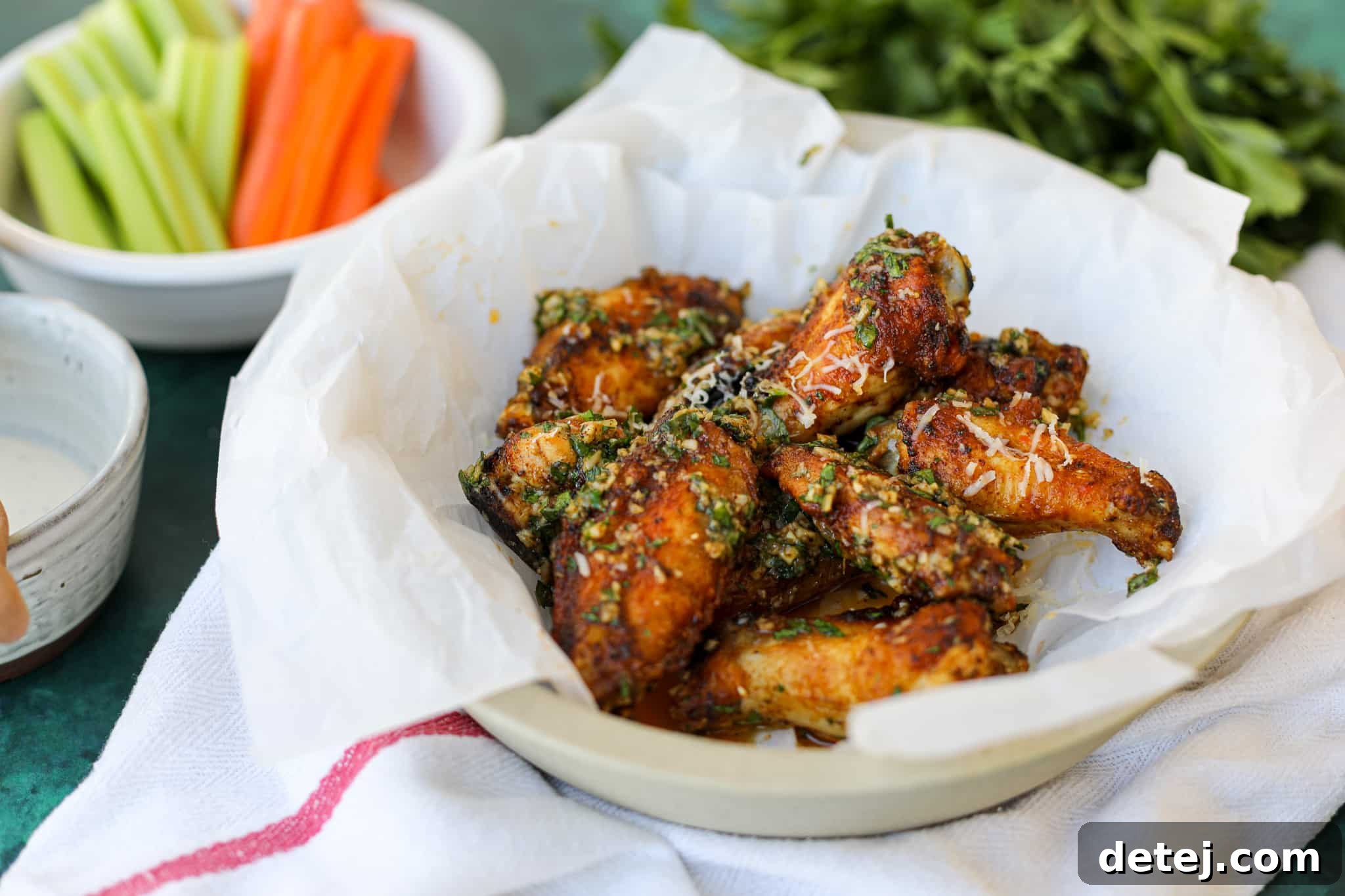 Raw chicken wings tossed with seasoning, ready for the air fryer