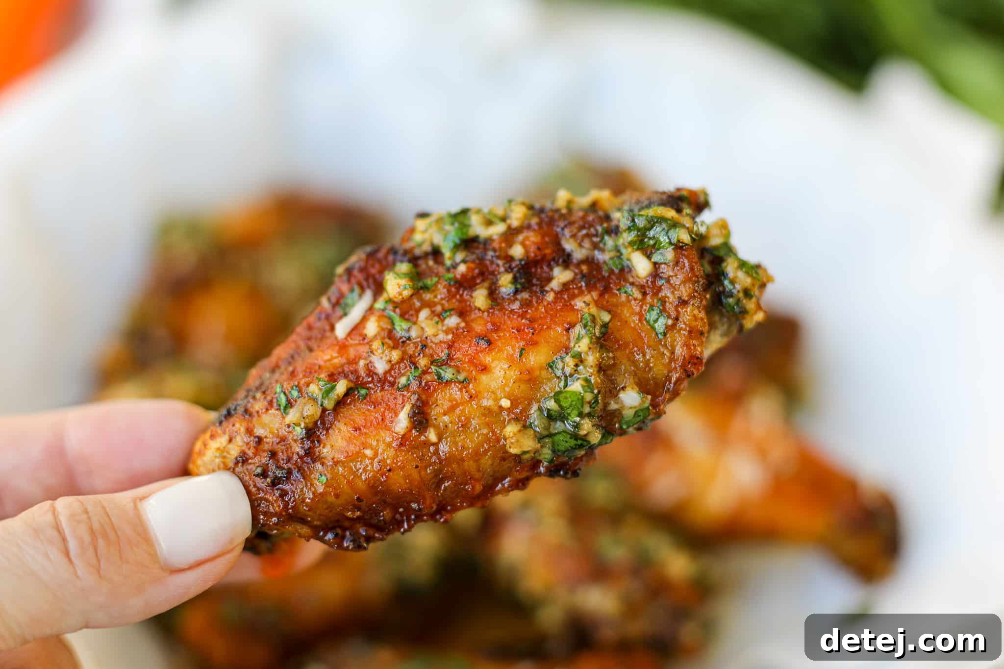 Platter of freshly air-fried garlic parmesan chicken wings